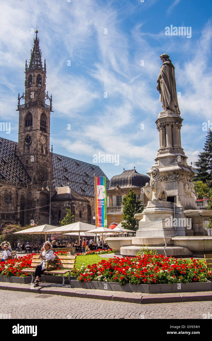 Gothic Santa Maria Assunta cathedral & statue of Walther von der Vogelweide, Bolzano town, Trentino-Alto Adige region, Italy. Stock Photo