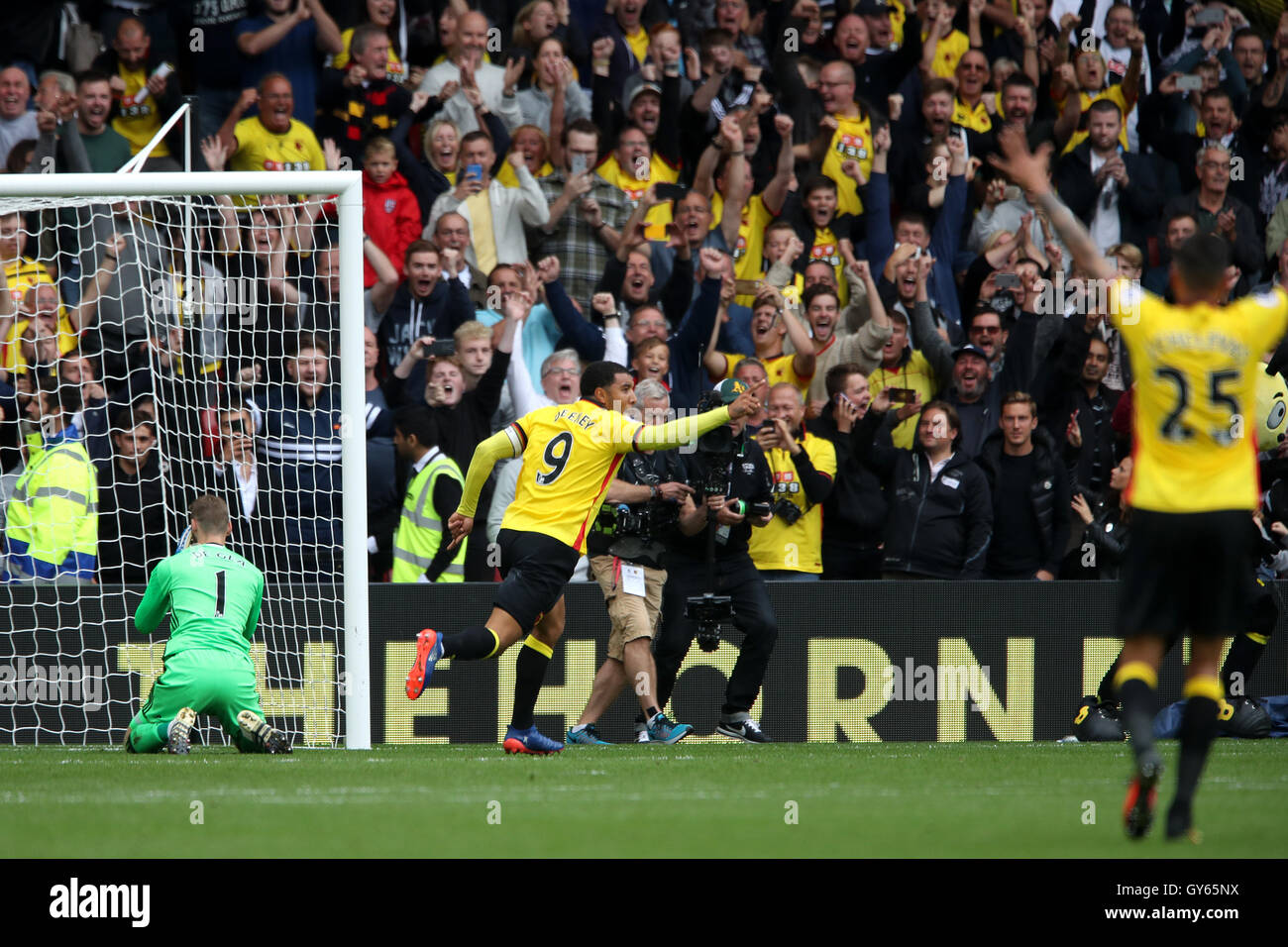 Watford's Troy Deeney (centre) celebrates scoring his side's thrid goal of the game during the Premier League match at Vicarage Road, Watford. Stock Photo