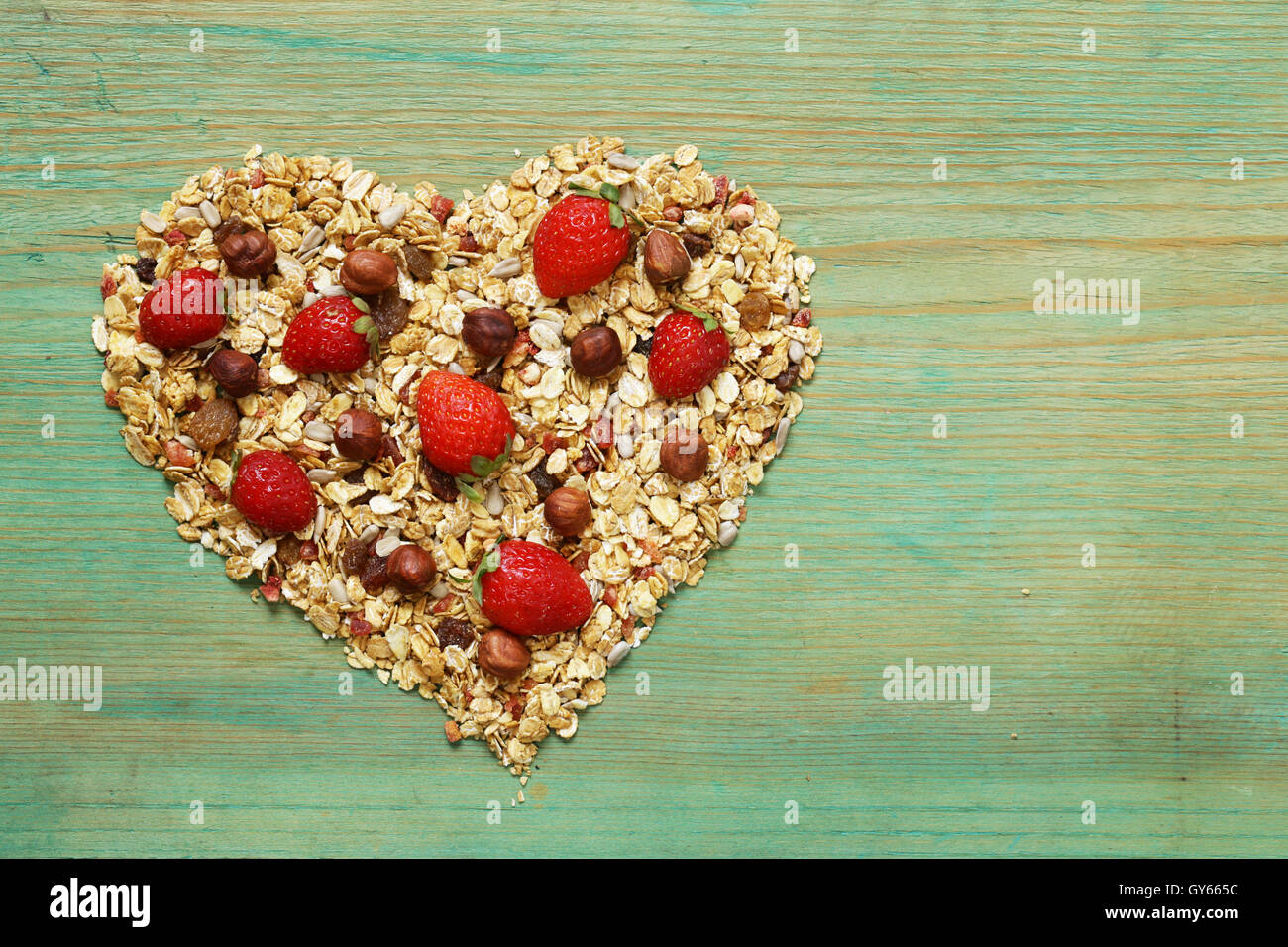 healthy eating granola cereal with nuts and fruit, in the shape of a