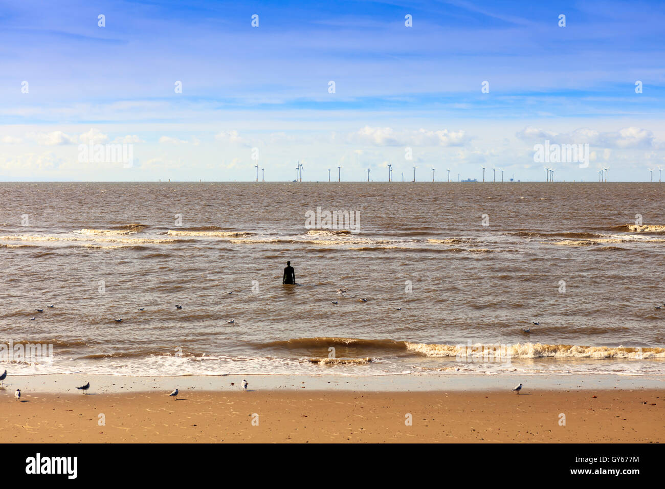 Tide at Crosby Beach near Liverpool with Anthony Gormley sculptures