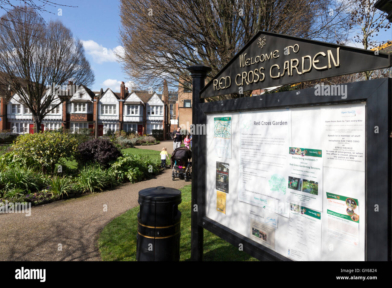 Noticeboard at the entrance to Red Cross Garden, Southwark, London, UK Stock Photo