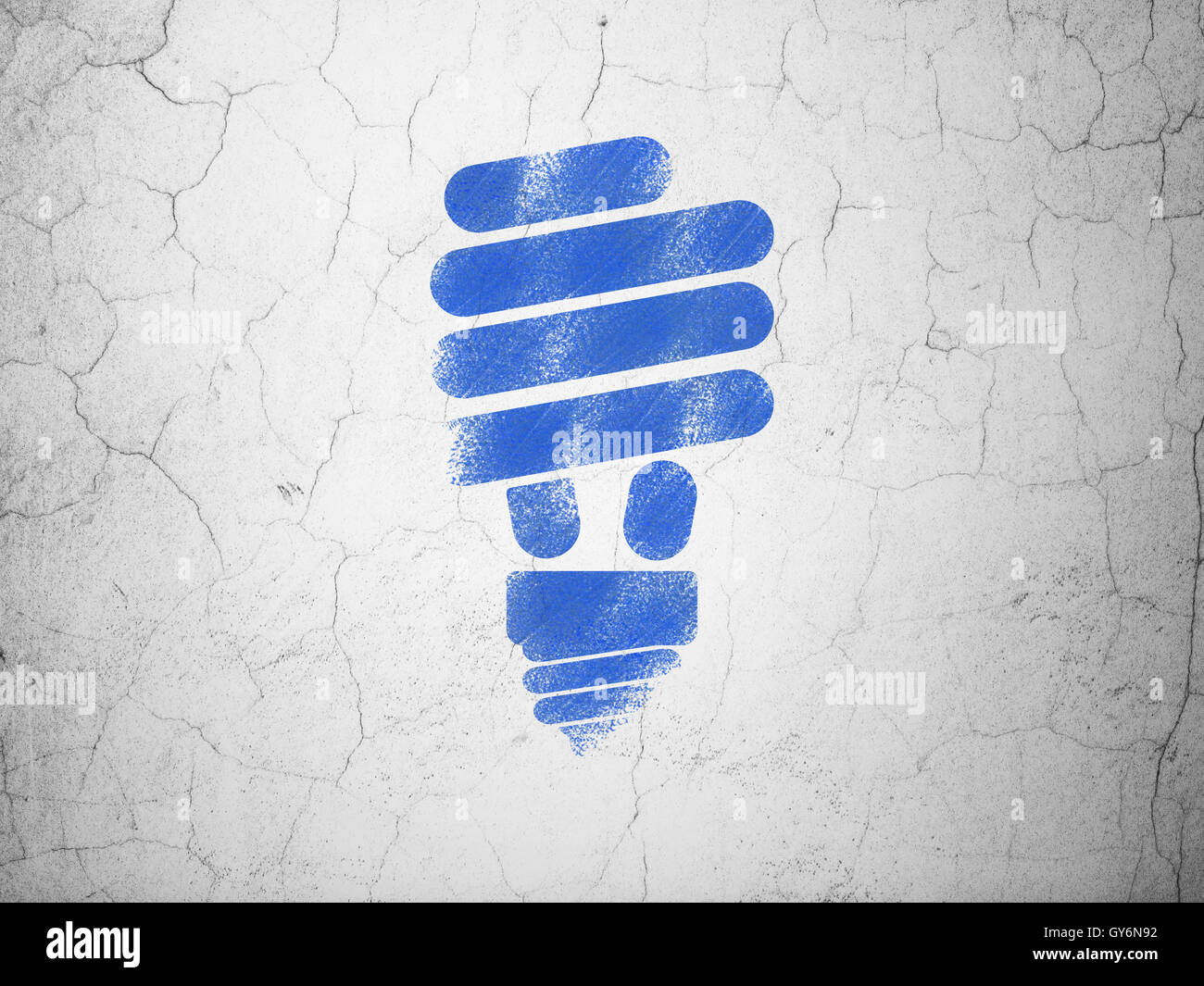 Business concept: Energy Saving Lamp on wall background Stock Photo - Alamy