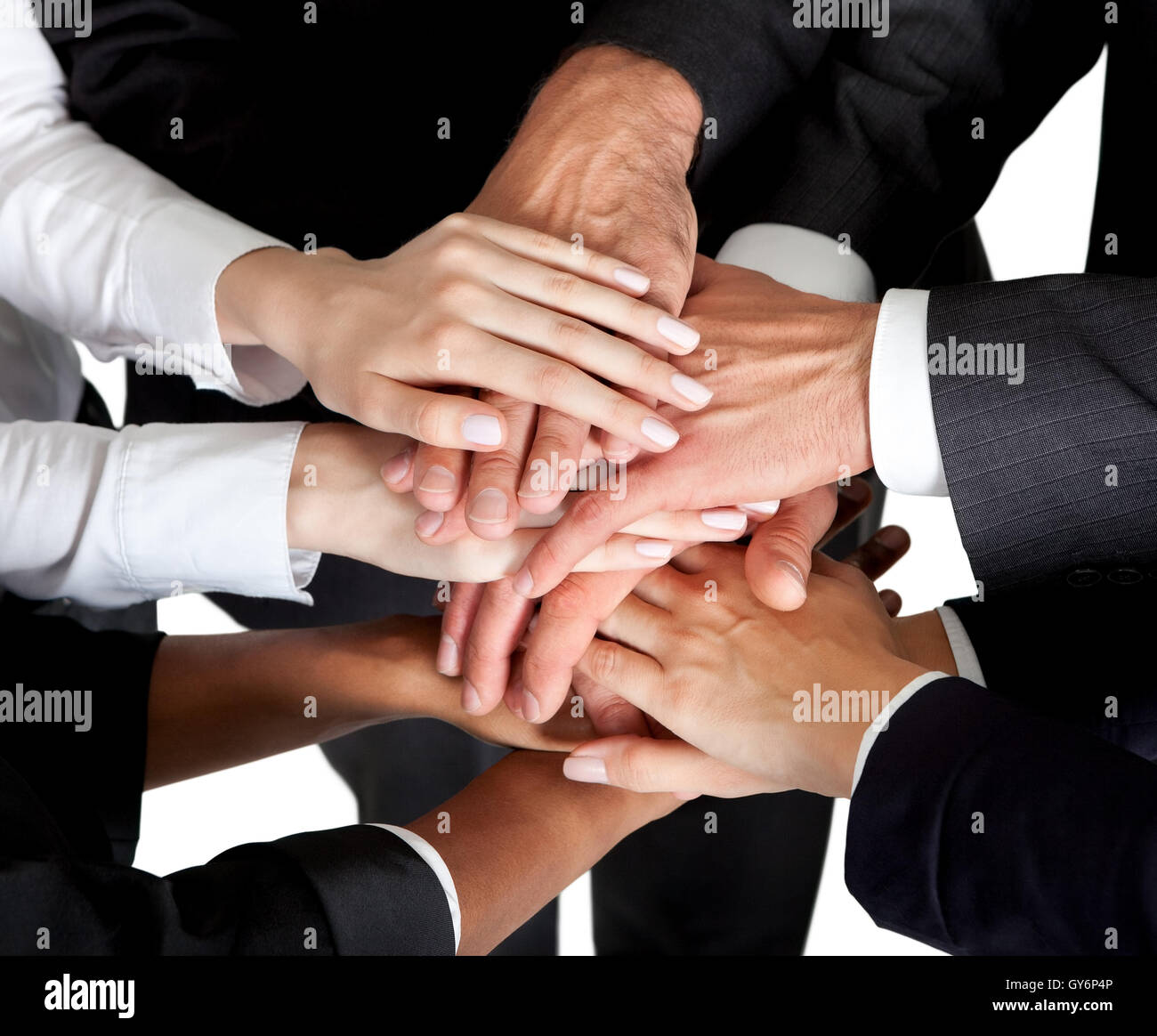 Closeup of mixed hands stacked together Stock Photo Alamy
