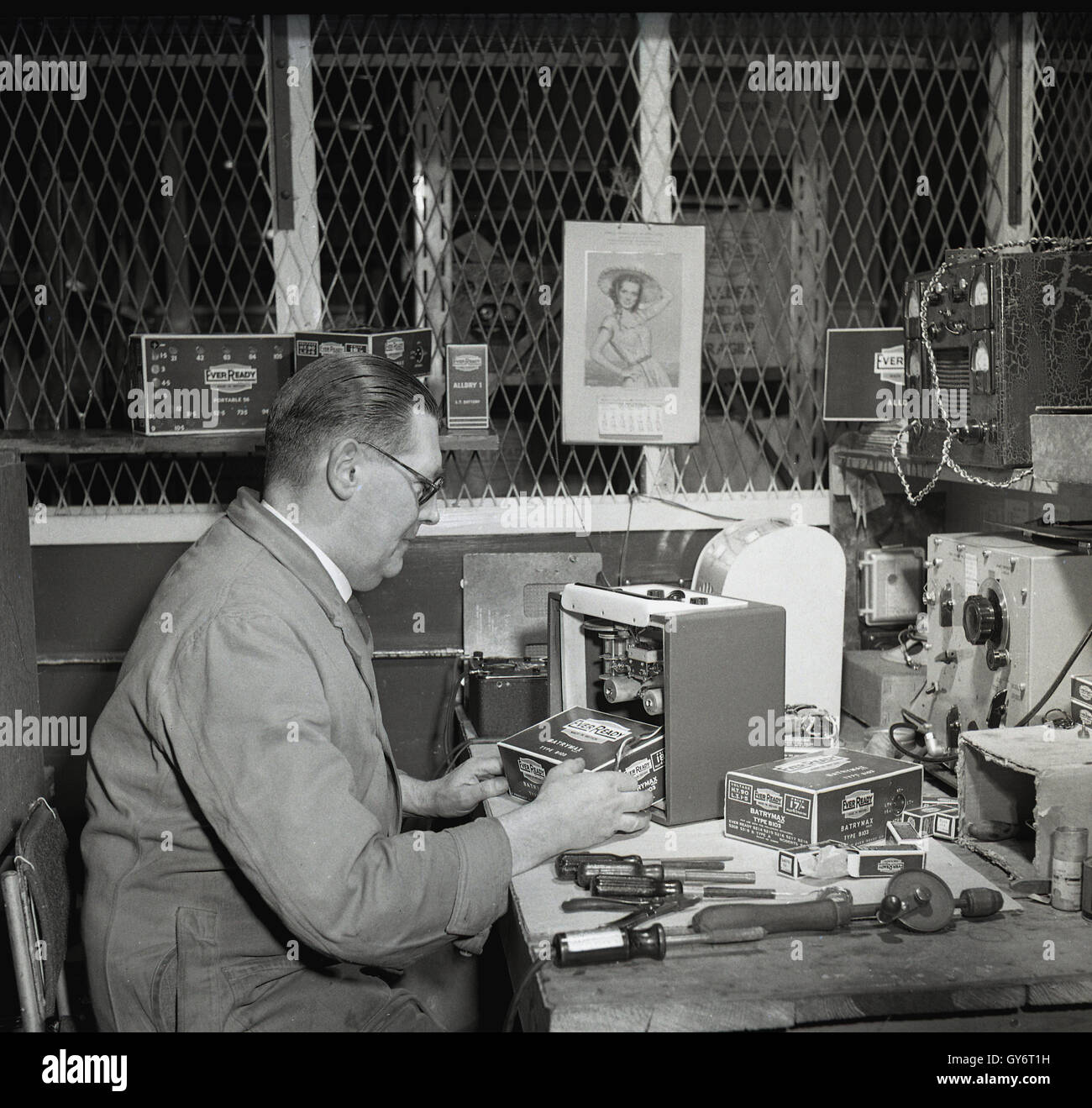 1950s, historical, male technician at desk testing large radio batteries,  Batrymax Type B103, at the Ever Ready factory, Wolverhampton, England Stock  Photo - Alamy