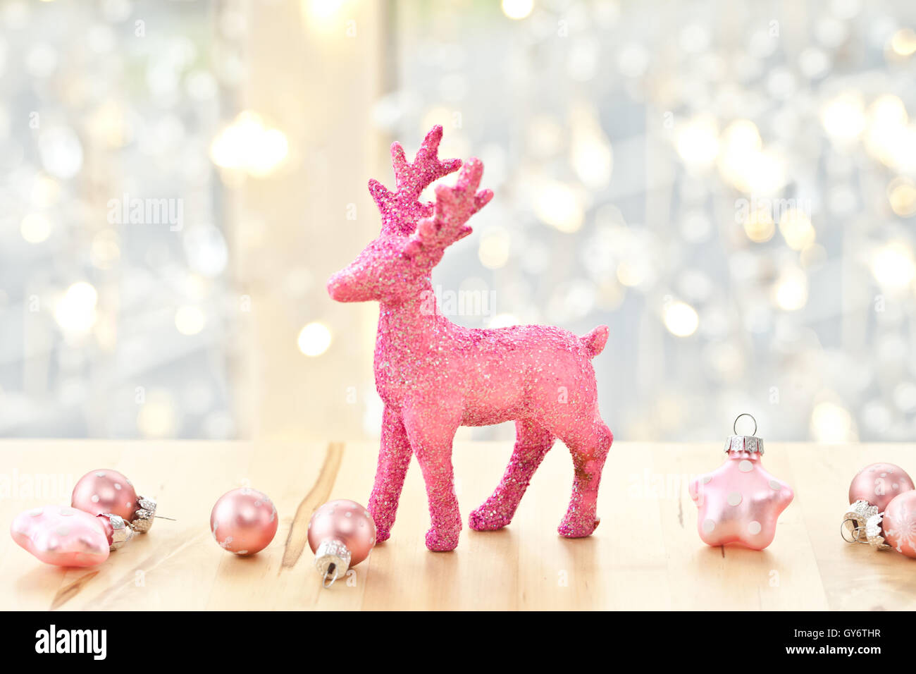 Pink deer and christmas decorations Stock Photo