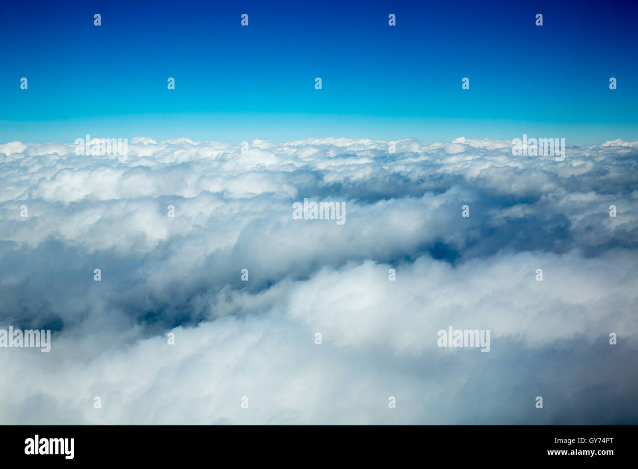 Aerial fluffy clouds view from high like a sea Stock Photo - Alamy
