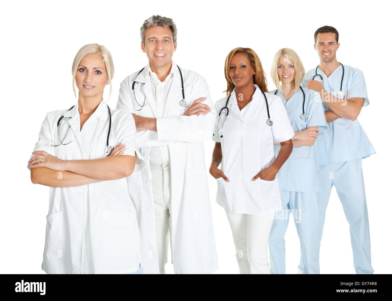 Team of doctors standing in line isolated on white Stock Photo