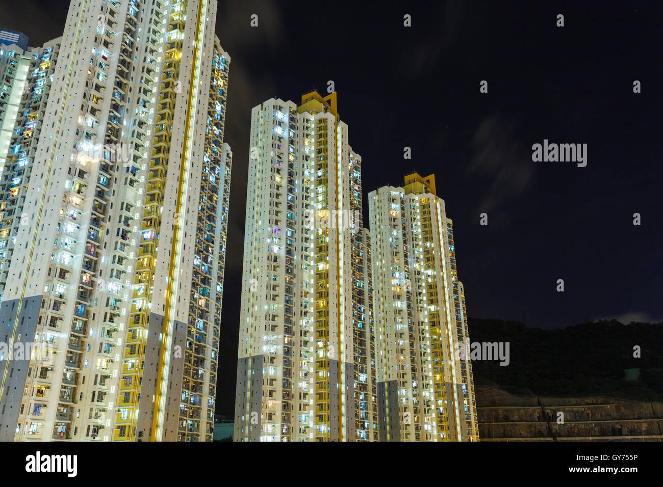 Residential building in Hong Kong at night Stock Photo - Alamy
