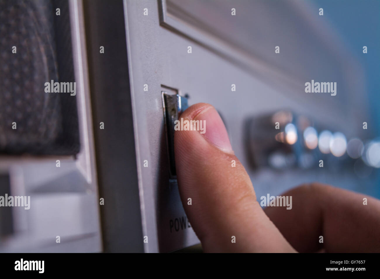 Turning on the radio Stock Photo