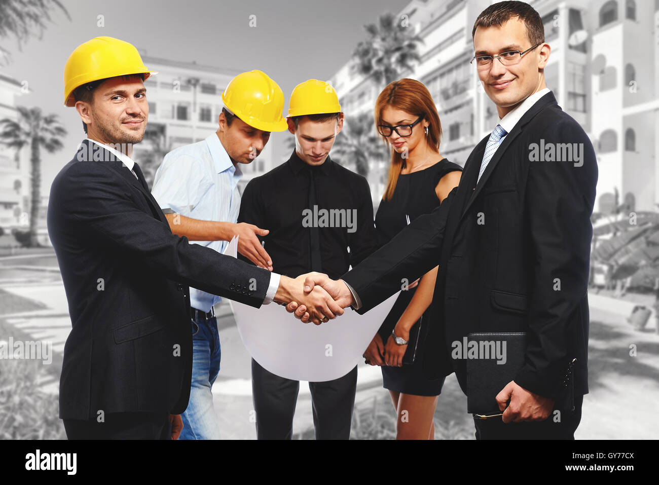 Construction teamwork handshake hires stock photography and images Alamy