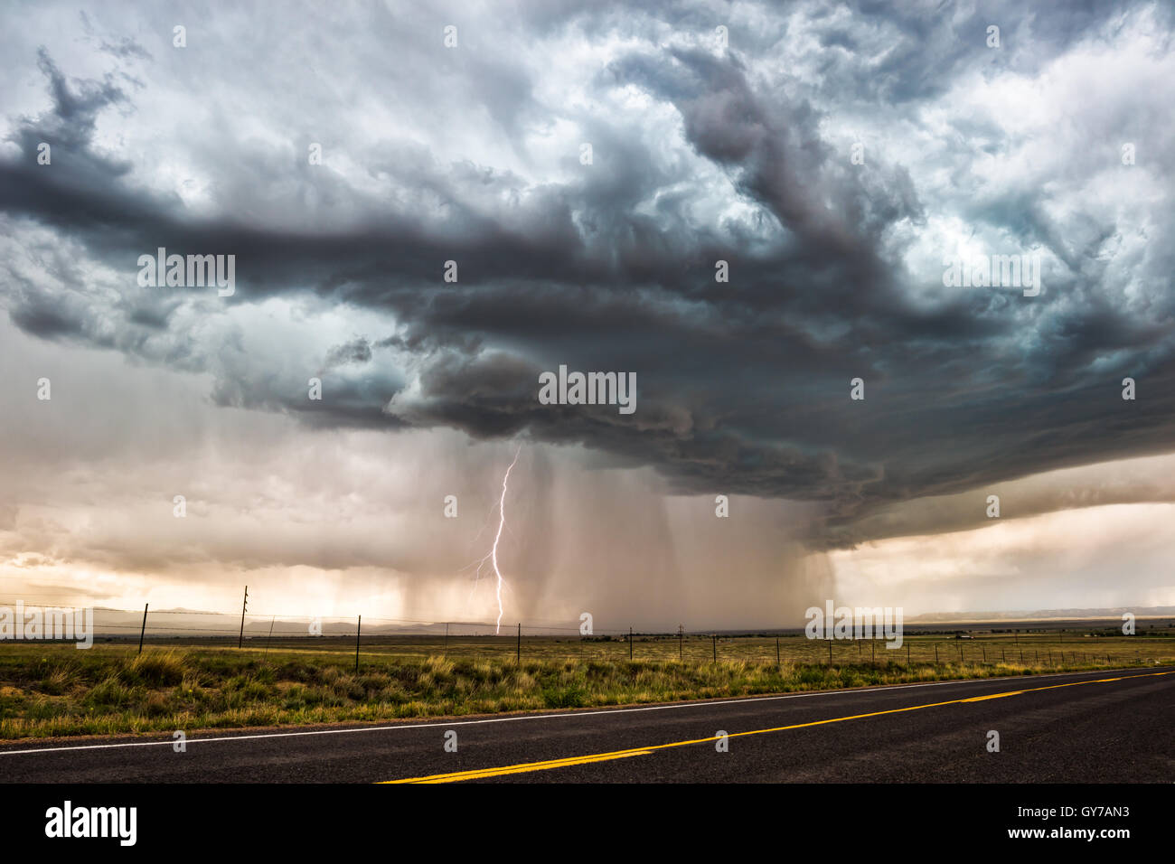 Lightning strike from a thunderstorm near Springer, New Mexico Stock