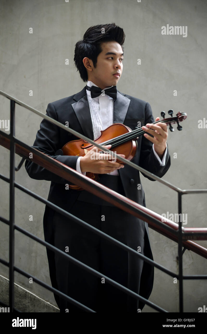 asia man with his violin Stock Photo