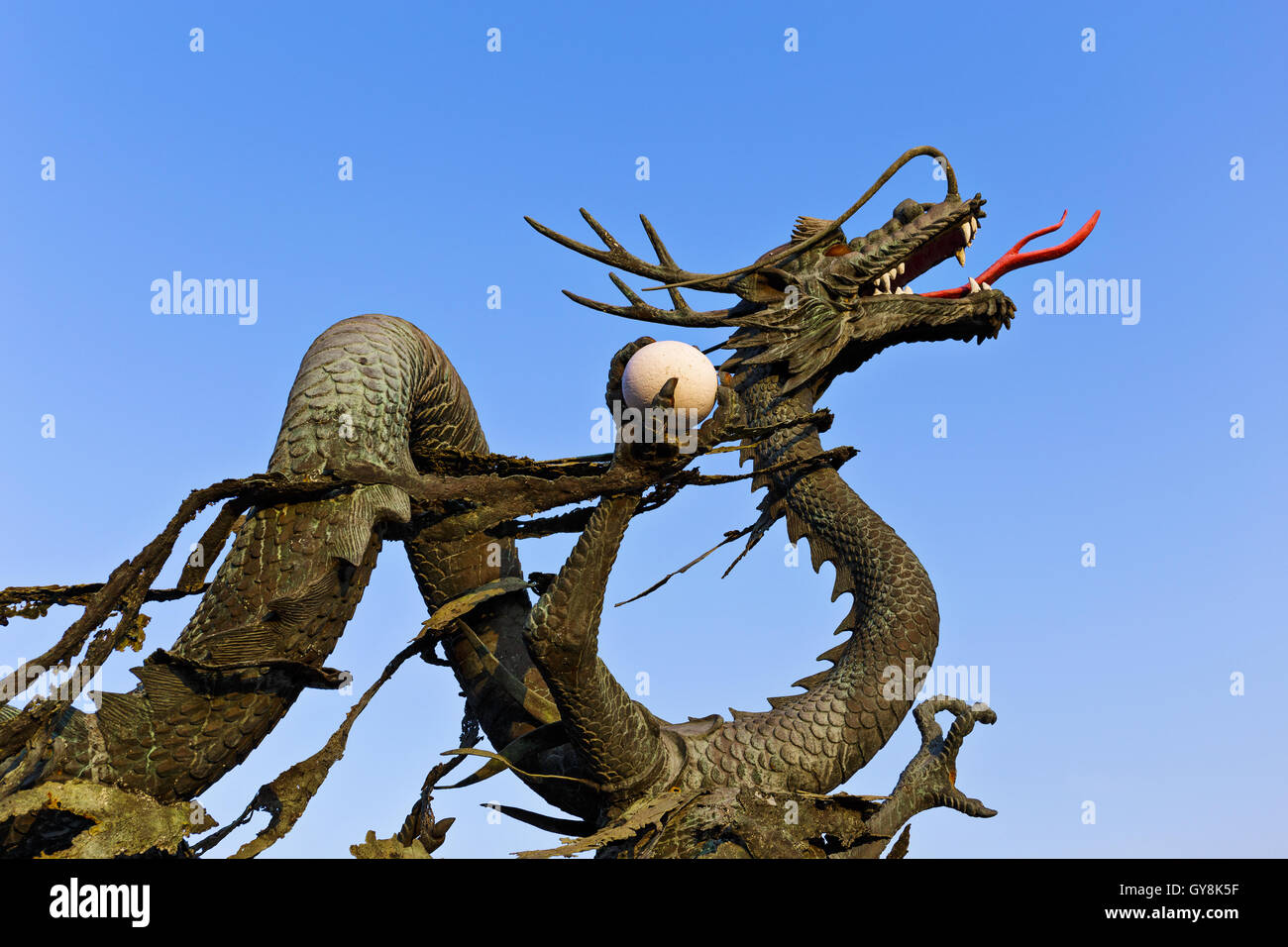 Concrete dragon statue Stock Photo - Alamy