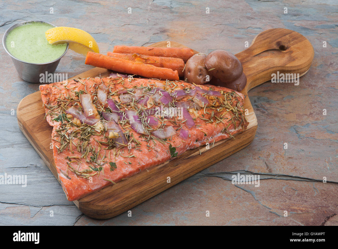 Salmon red onions and rosemary Stock Photo