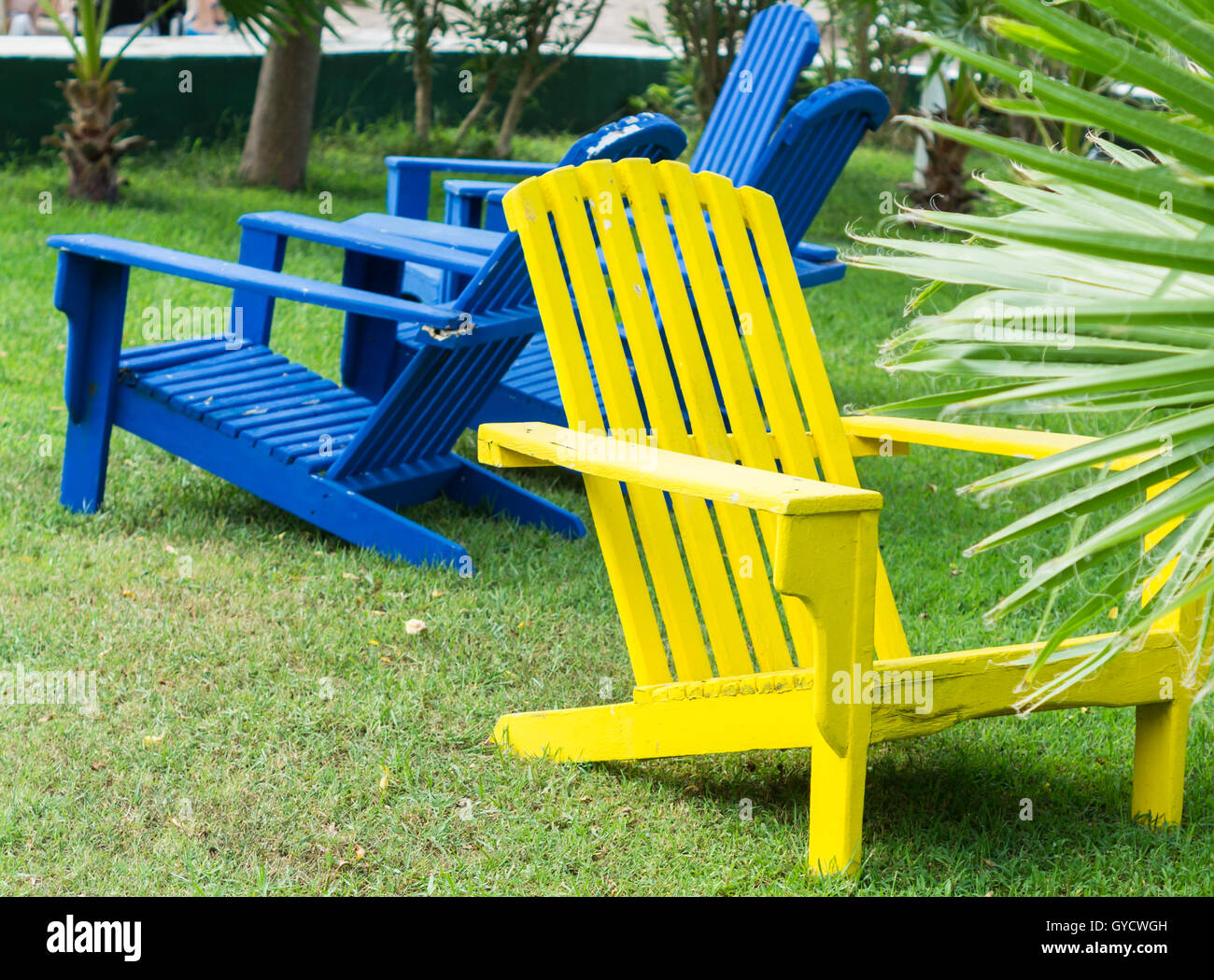 Bright Color Wooden Sun Chairs In The Beach Garden Stock Photo