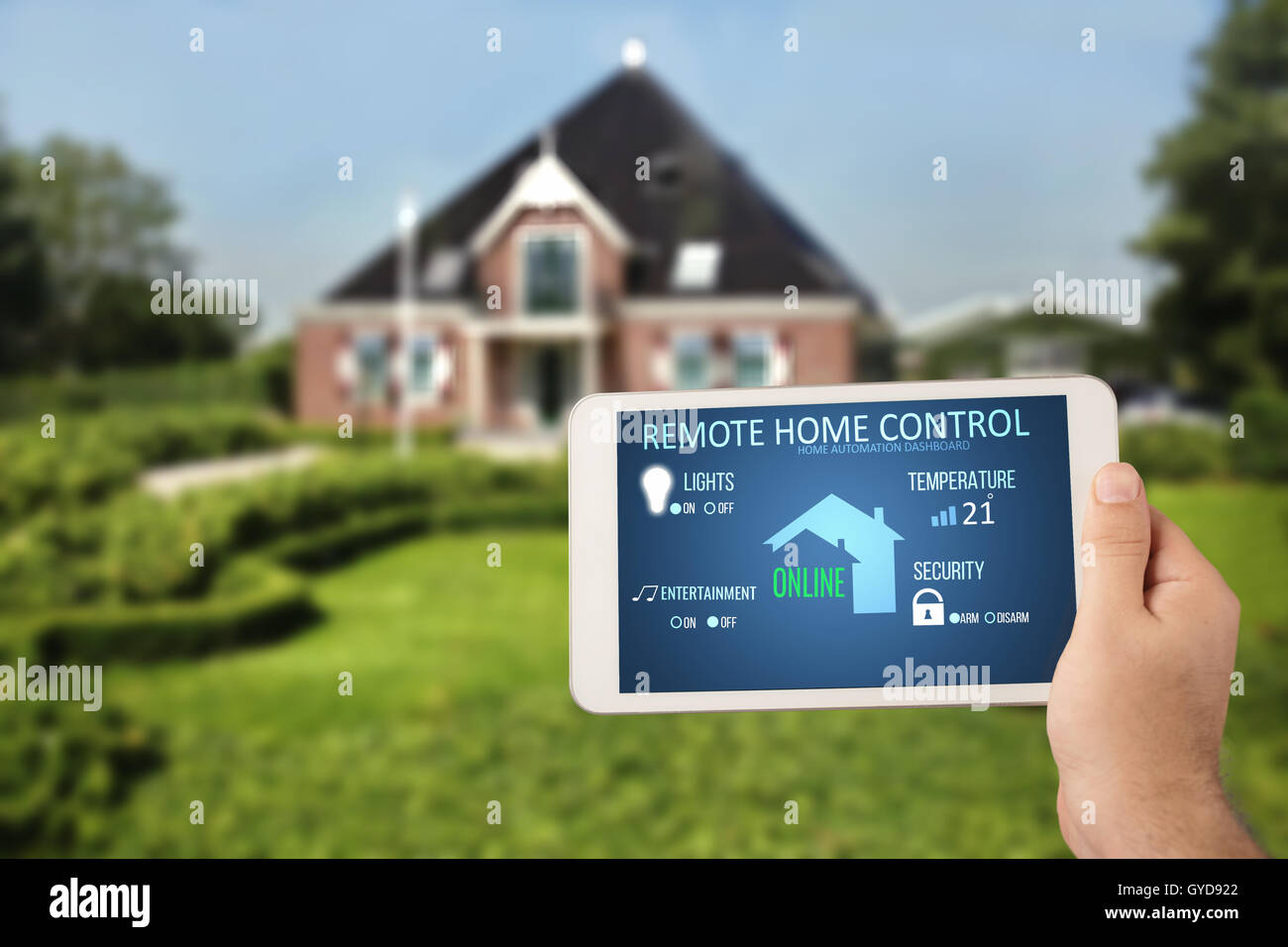 Remote home control system on a digital tablet. Stock Photo