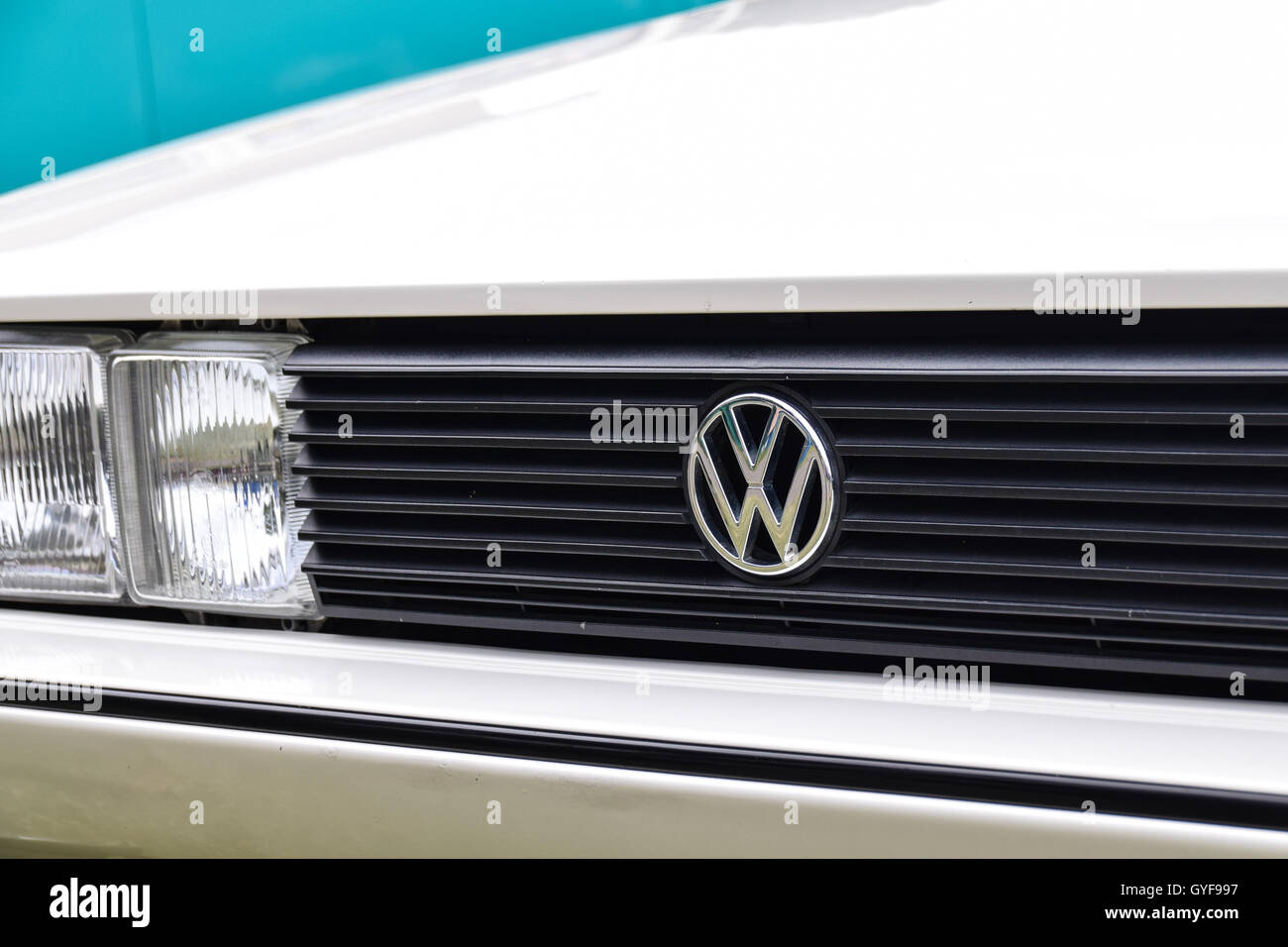 VW badge on the grill of vintage Voltswagen Scirocco Stock Photo