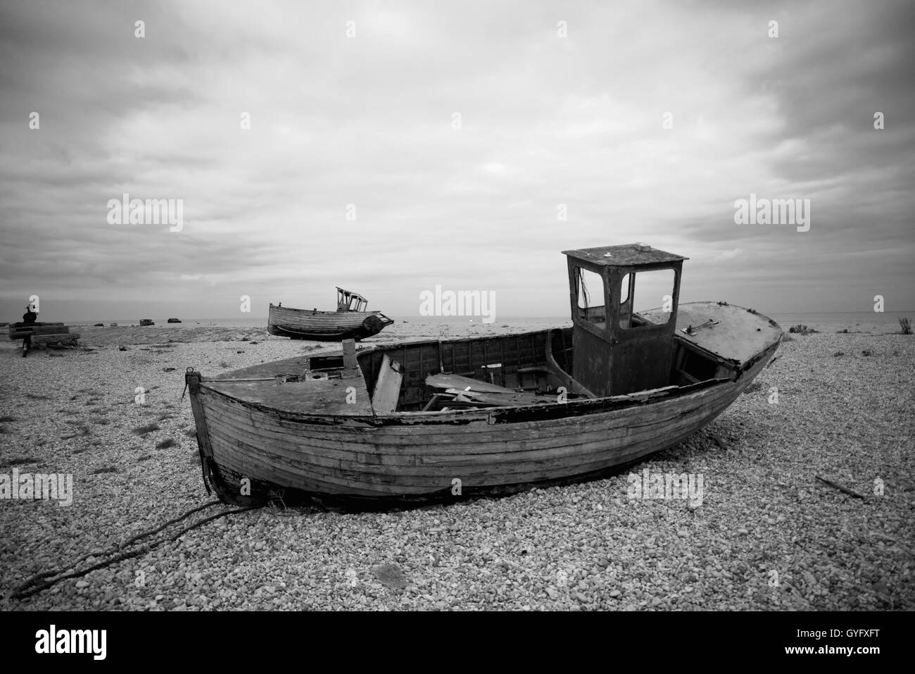 Wrecked boat on Dungeness beach Stock Photo