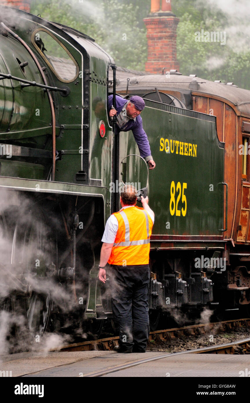 Collecting the single line token from the signalman at Grosmont station ...