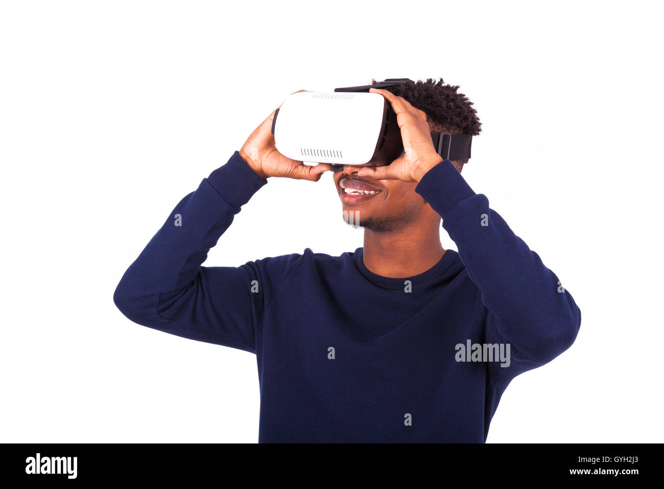 African American young man wearing vr virtual reality headset over ...
