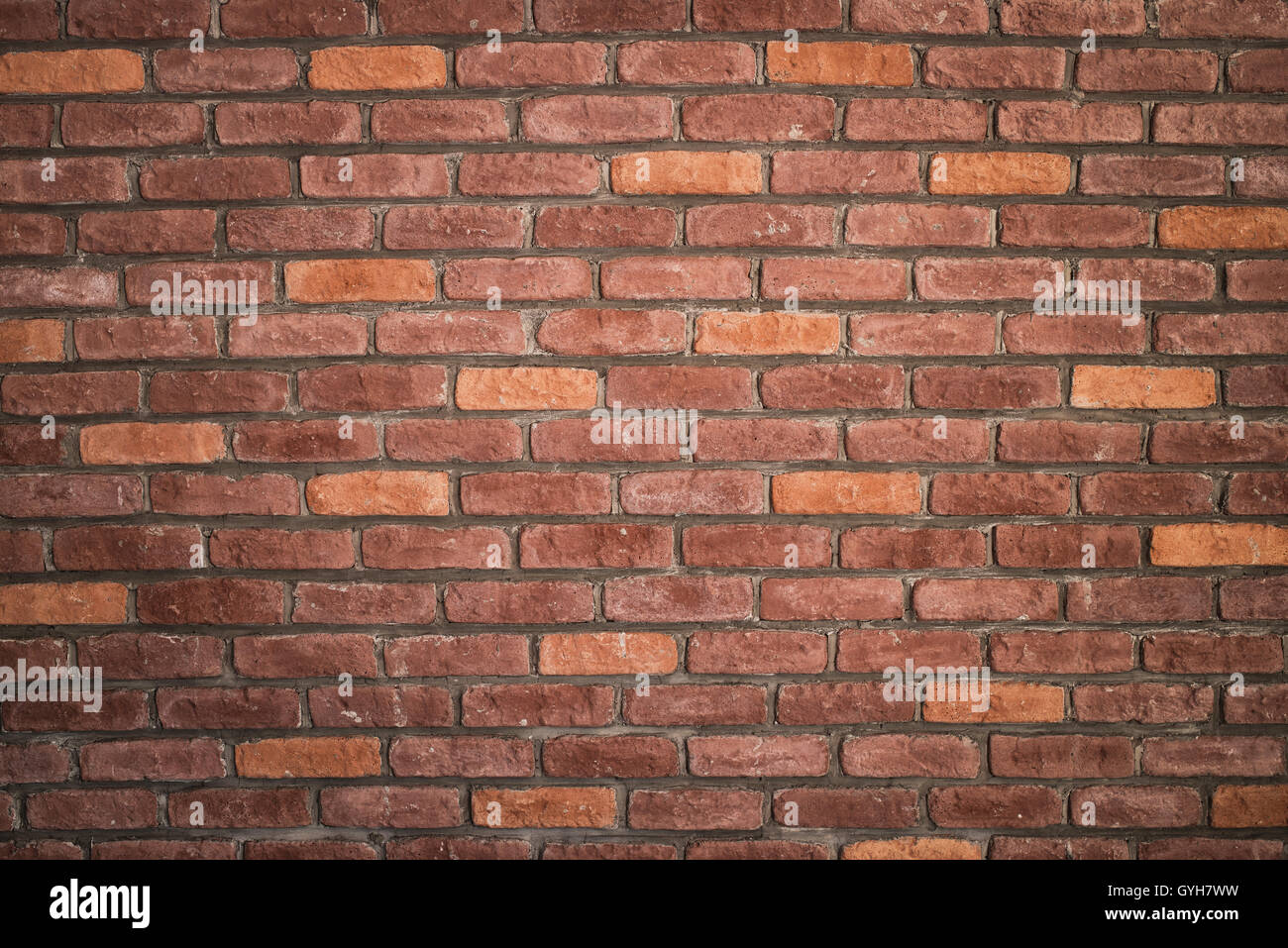 Background of red brick wall pattern texture. Great for graffiti inscriptions. Stock Photo