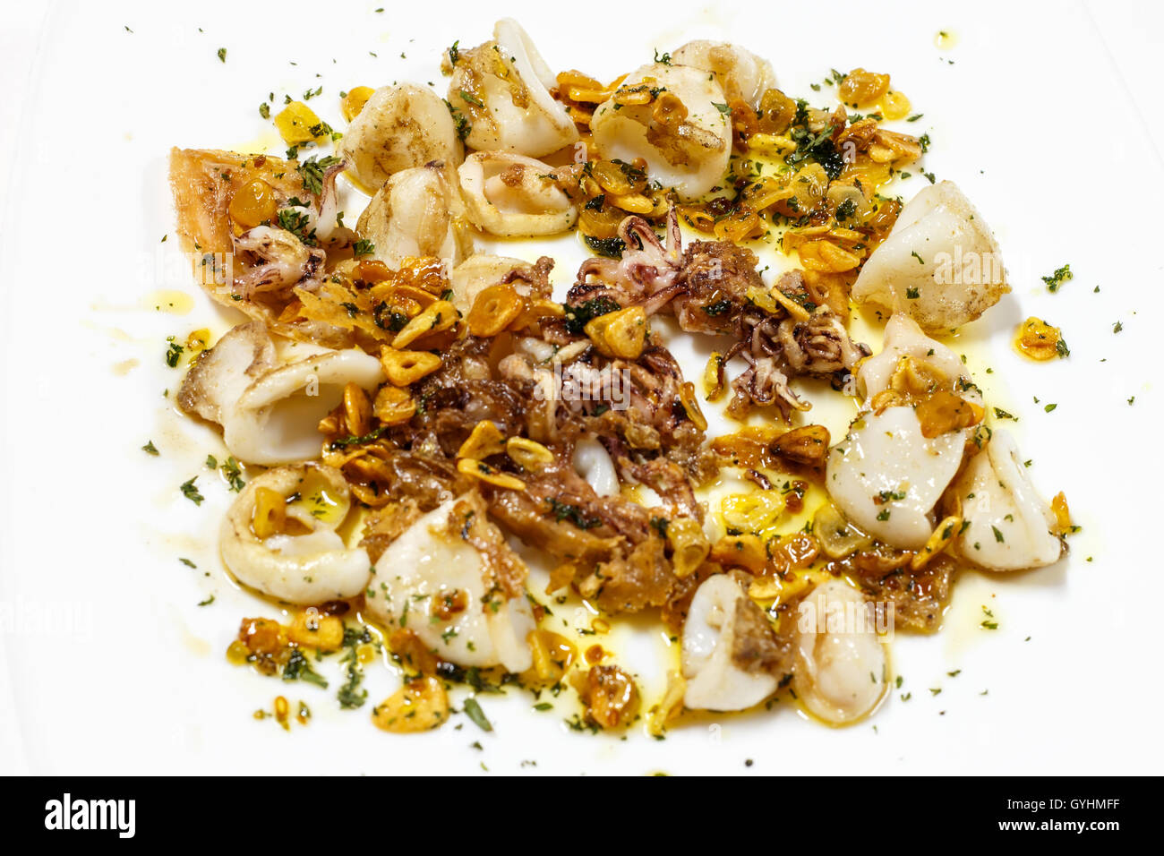 cooked squid plate with olive oil Stock Photo