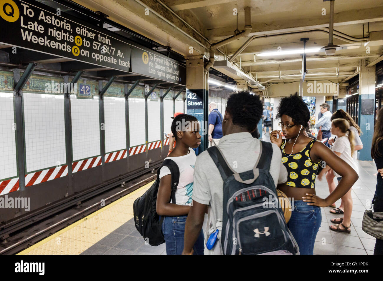 New York City,NY NYC,Manhattan,Midtown,42nd Street,Times Square,subway,station,MTA,public transportation,platform,Black Blacks African Africans ethnic Stock Photo