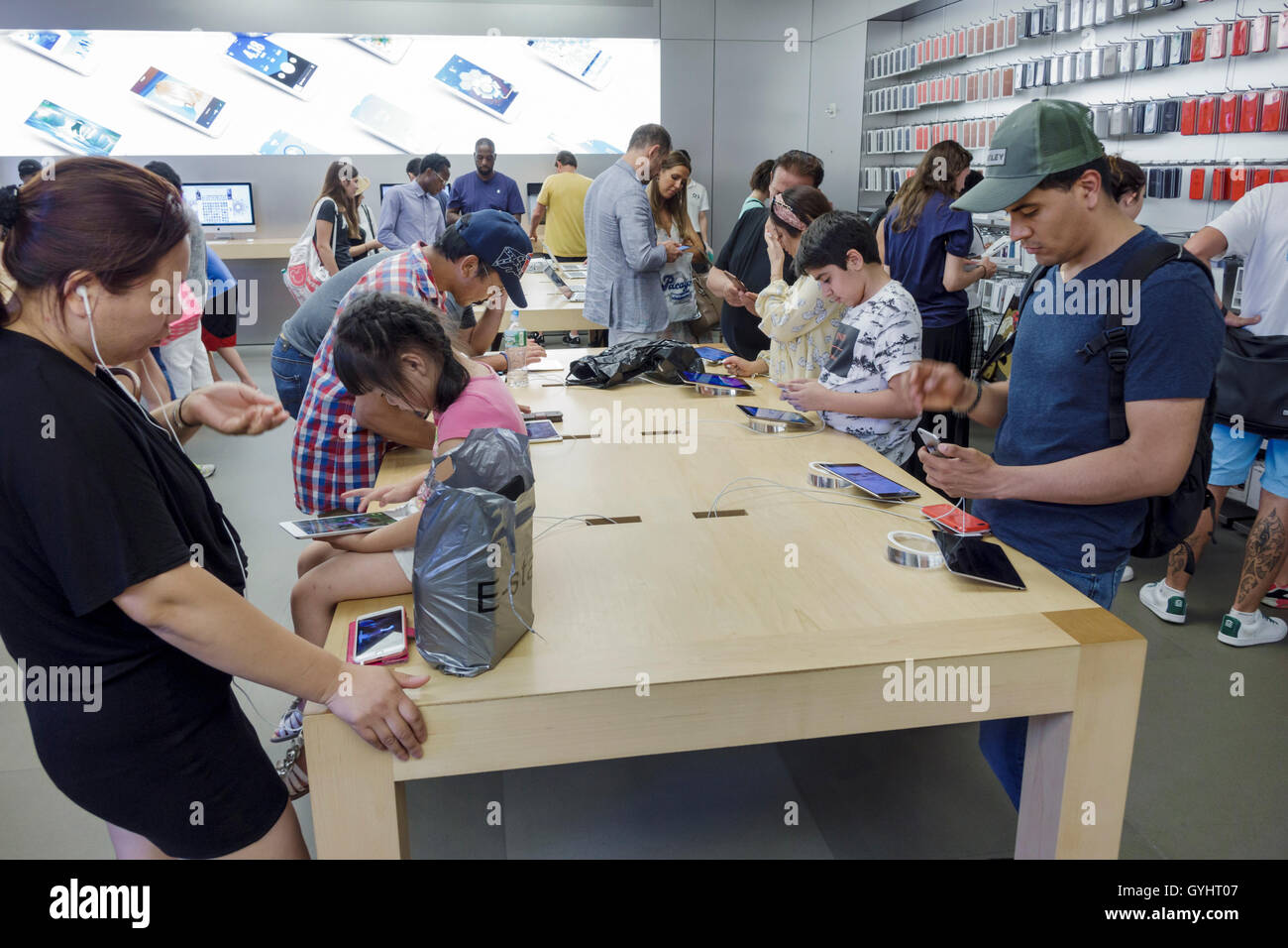 New York City,NY NYC,Manhattan,Midtown,Fifth Avenue,Apple store retail,shopping shopper shoppers shop shops market markets marketplace buying selling Stock Photo