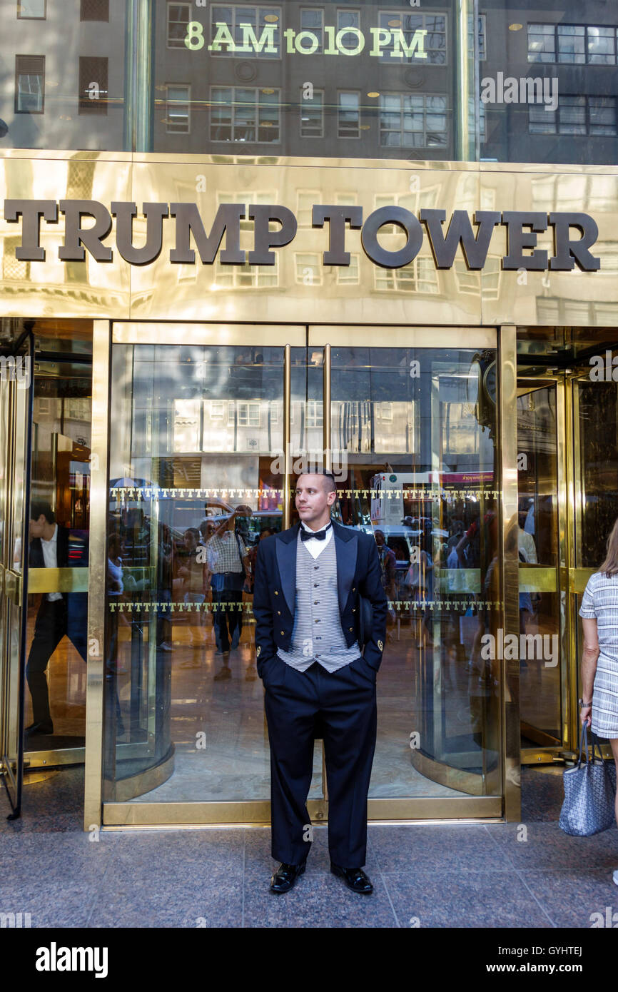New York City,NY NYC Manhattan,Midtown,Fifth Avenue,Trump Tower,entrance,sign,doorman,job,tuxedo tailcoat,adult,adults,man men male,young adult,NY1607 Stock Photo