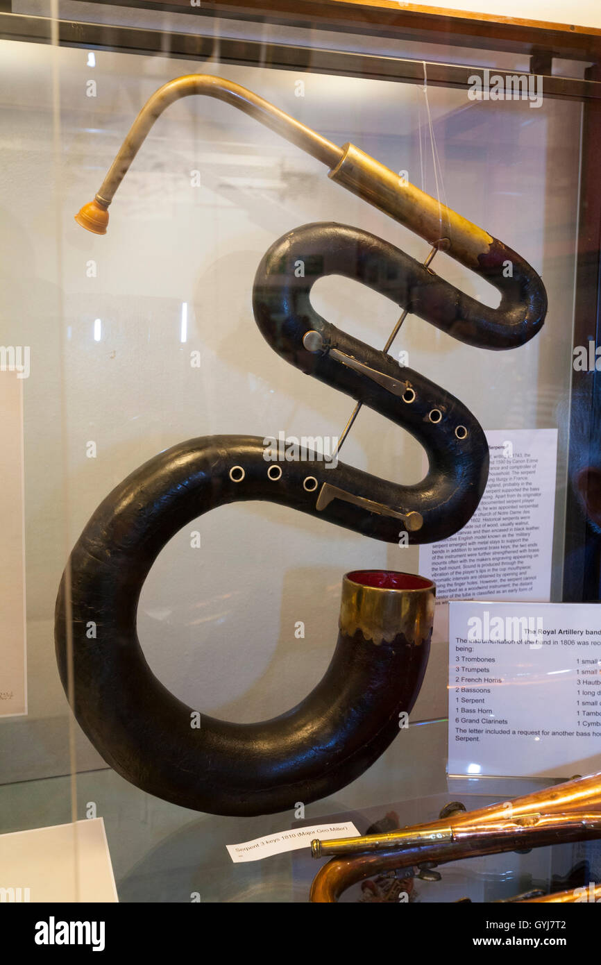 Serpent bass wind instrument inside / interior of the Museum of Army Music. Kneller Hall, Whitton, Twickenham. UK. Stock Photo