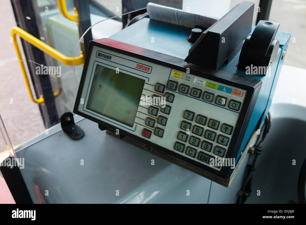 Wayfarer Transys early Oyster card reader / validator / validators & ticket machine seen from the driver's seat of a London bus. Stock Photo