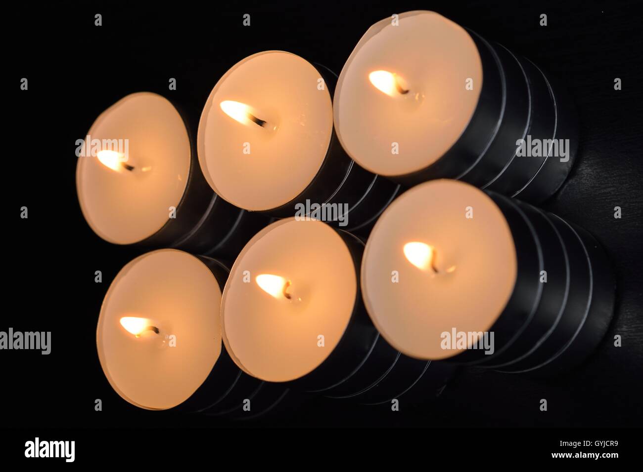 Candle in the darkness Stock Photo Alamy