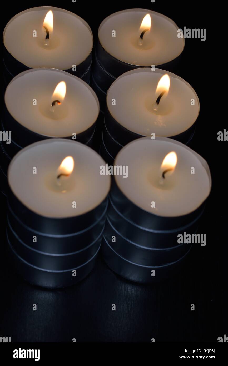 Candle in the darkness Stock Photo Alamy