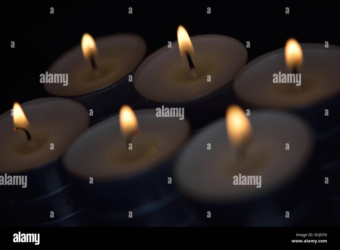 Candle in the darkness Stock Photo Alamy