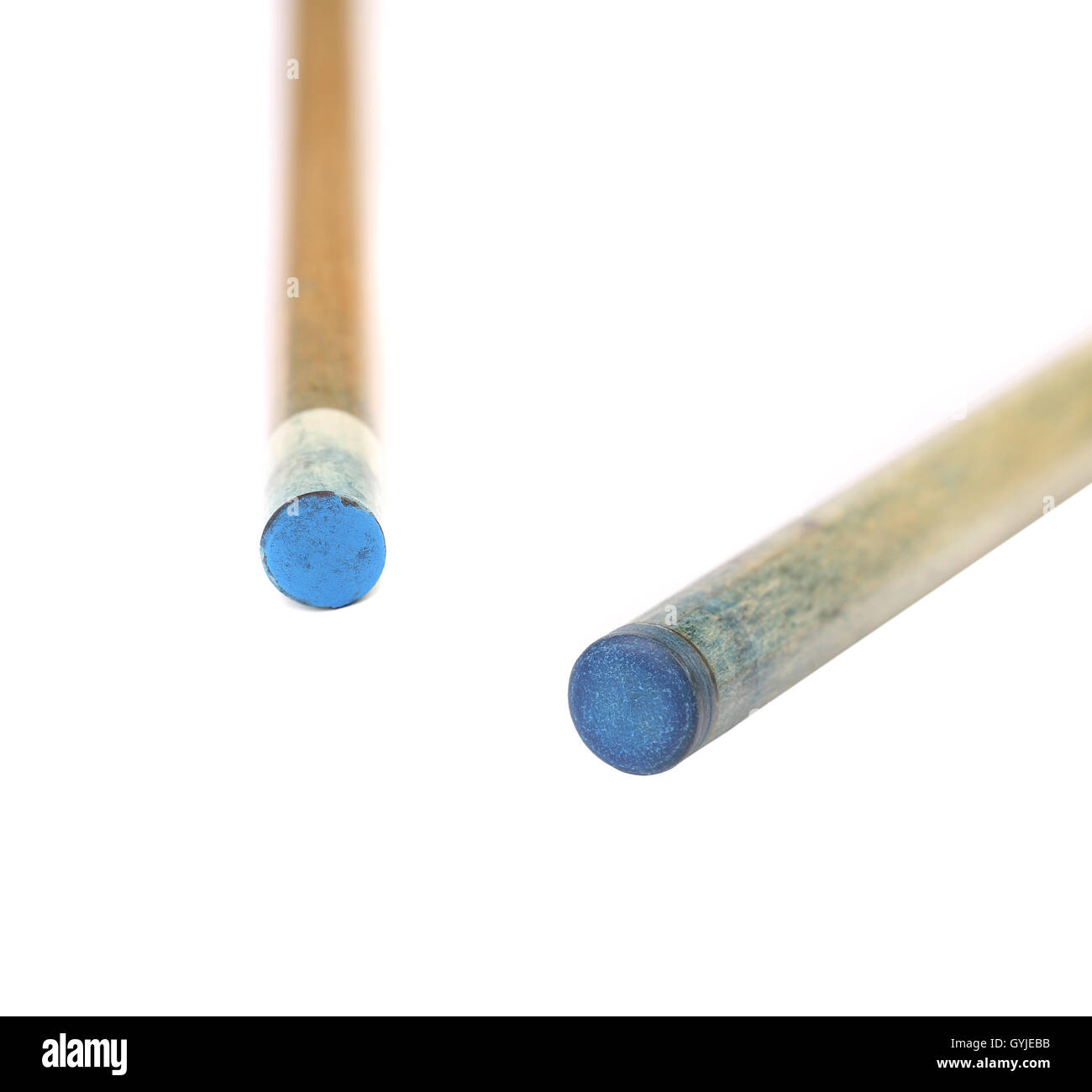 Two pool cues. Blue end. Stock Photo