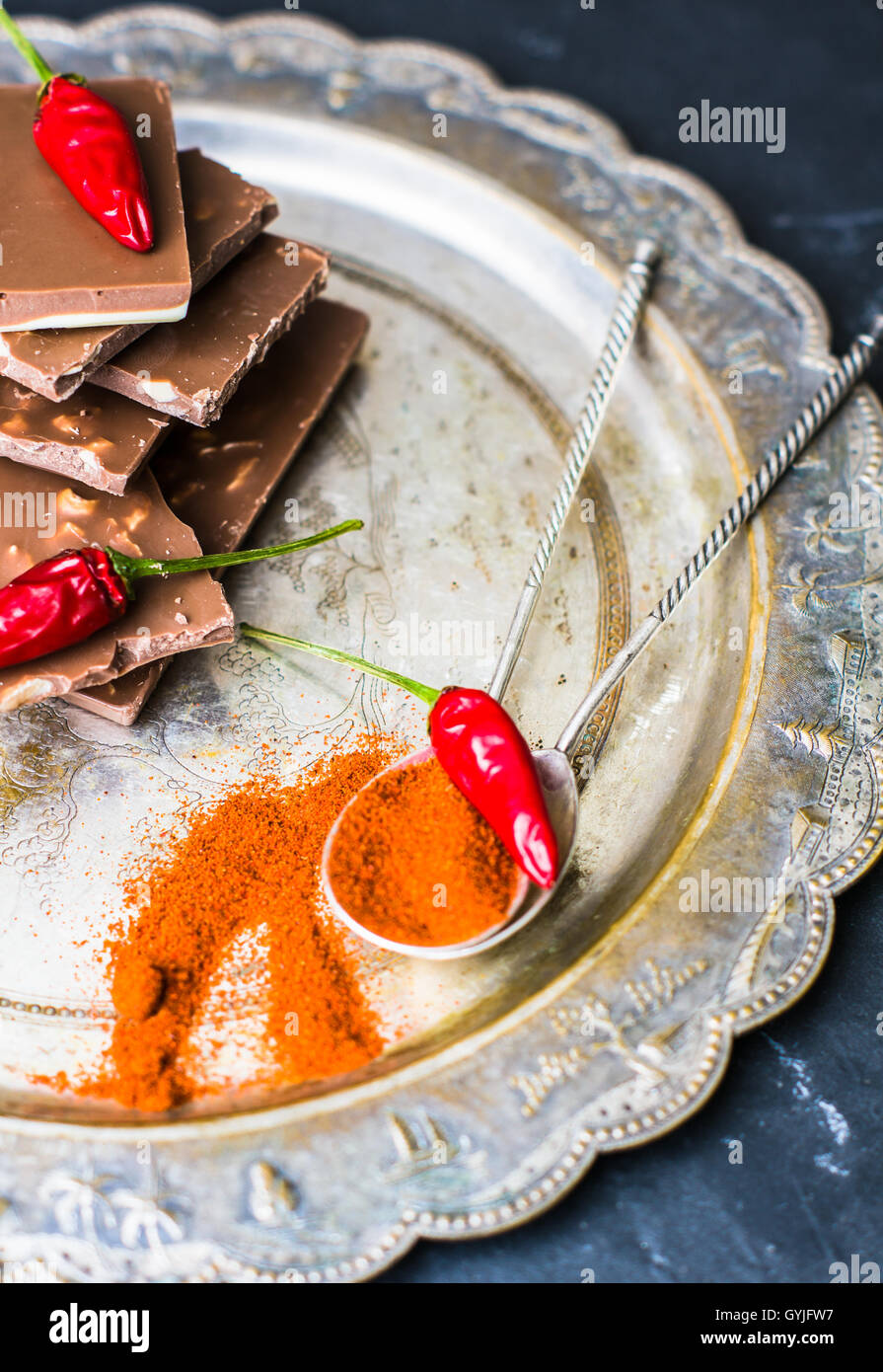 Spice red chilli peppers and chocolate, selective focus Stock Photo - Alamy