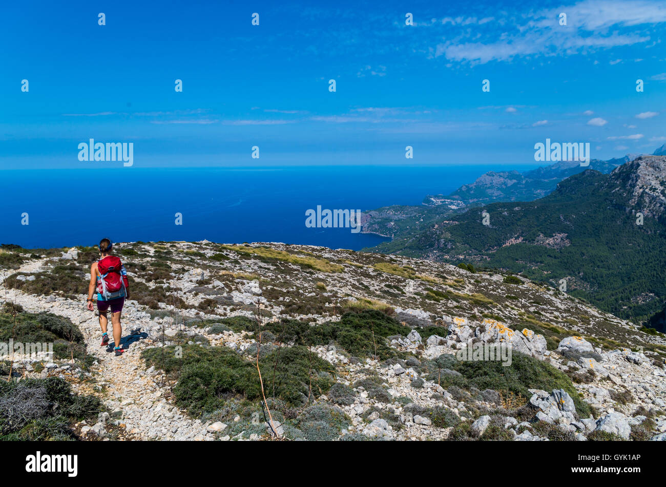 Female hiking in the mountains of Tramuntana, Mallorca, Baleares, Spain Stock Photo