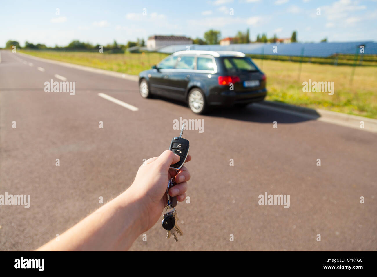 Car key makes a car open Stock Photo