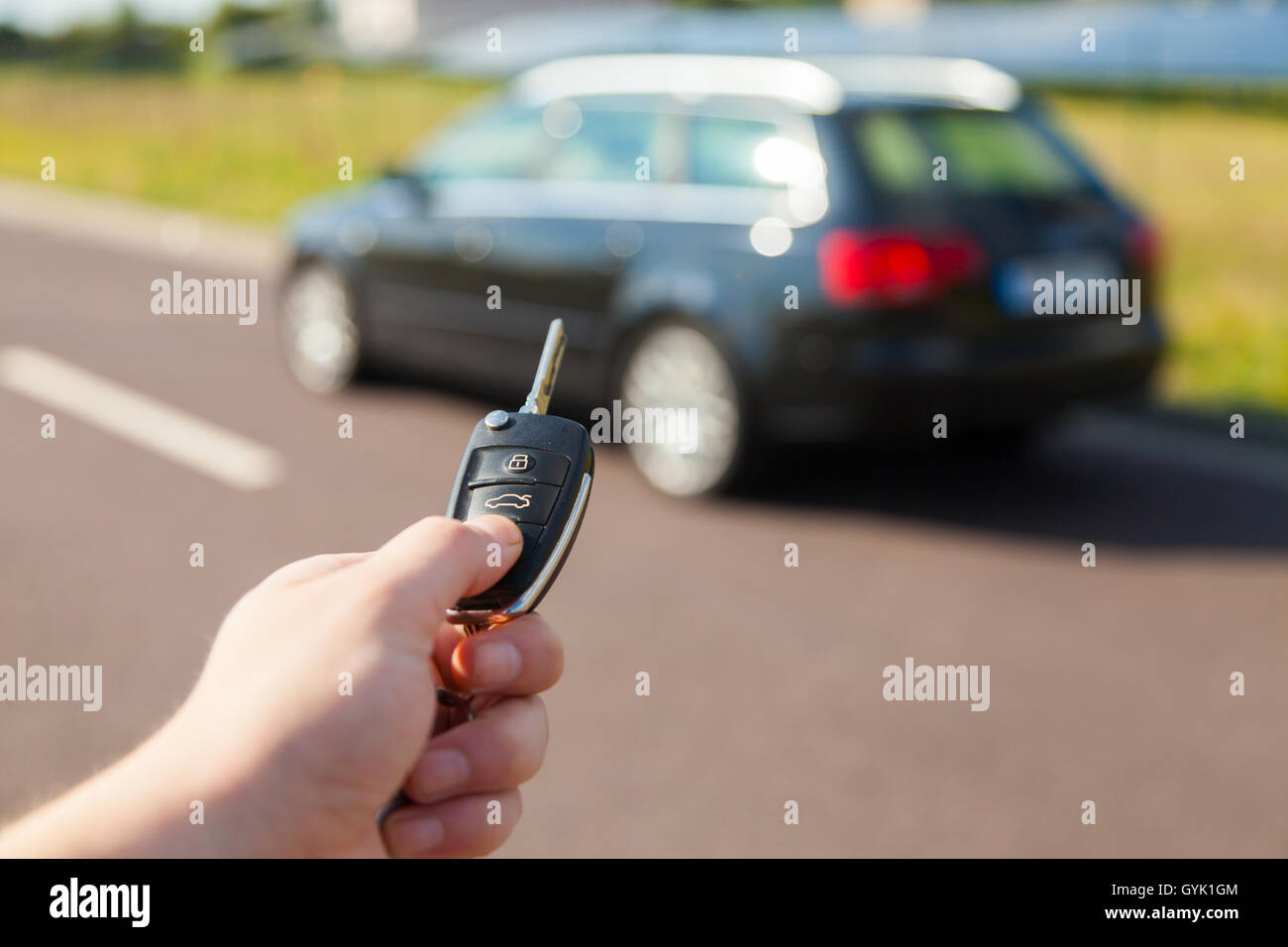 Car key makes a car open Stock Photo