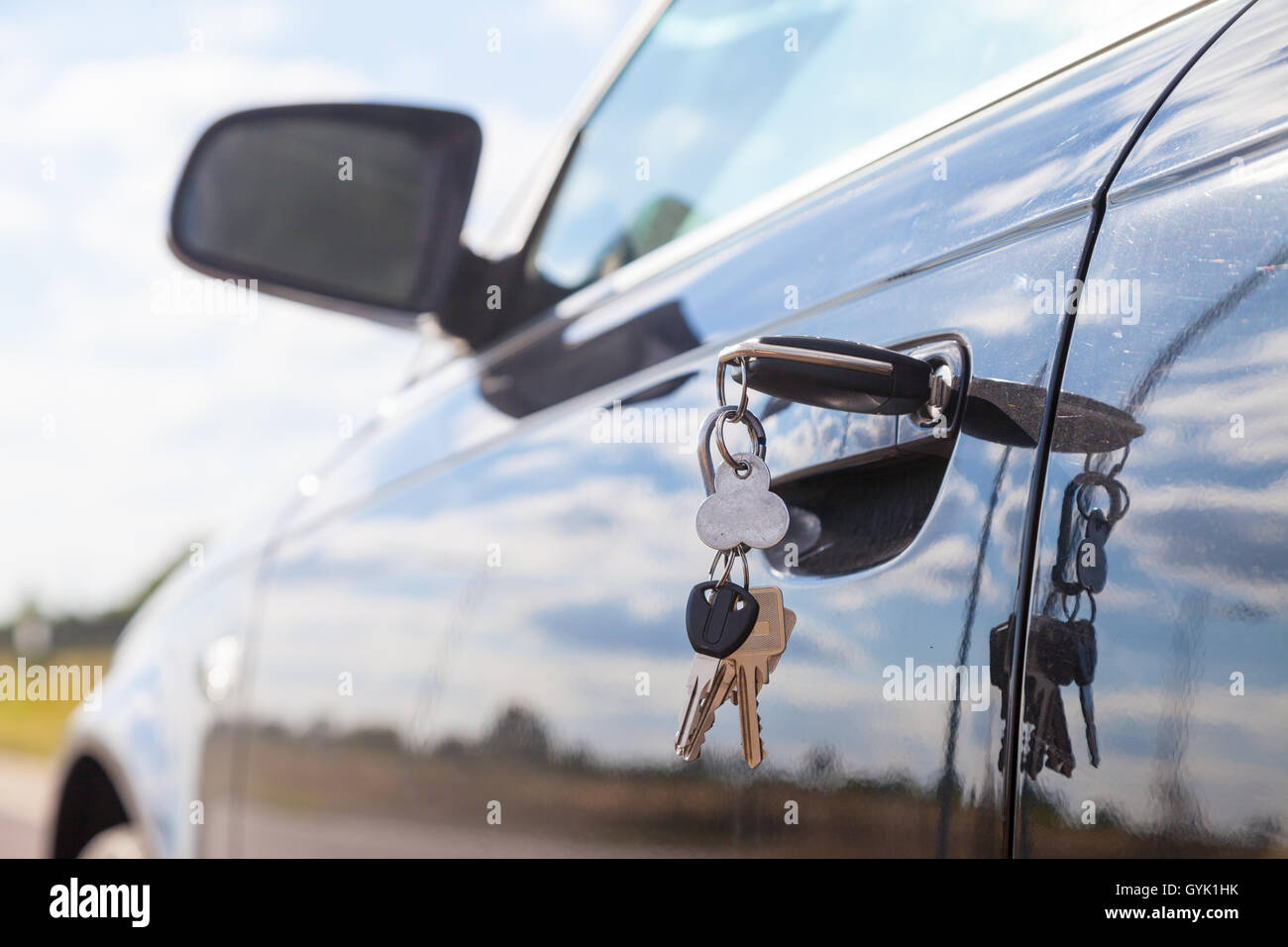 car key on car lock Stock Photo