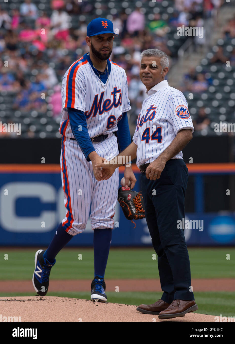 Mayor of London Sadiq Khan pitches the first ball at a baseball game between New York Mets and Minnesota Twins at Citi Field in New York City, during a three day visit to the US capital as part of his visit to North America, where he is due to meet NYC Mayor Bill de Blasio. Stock Photo