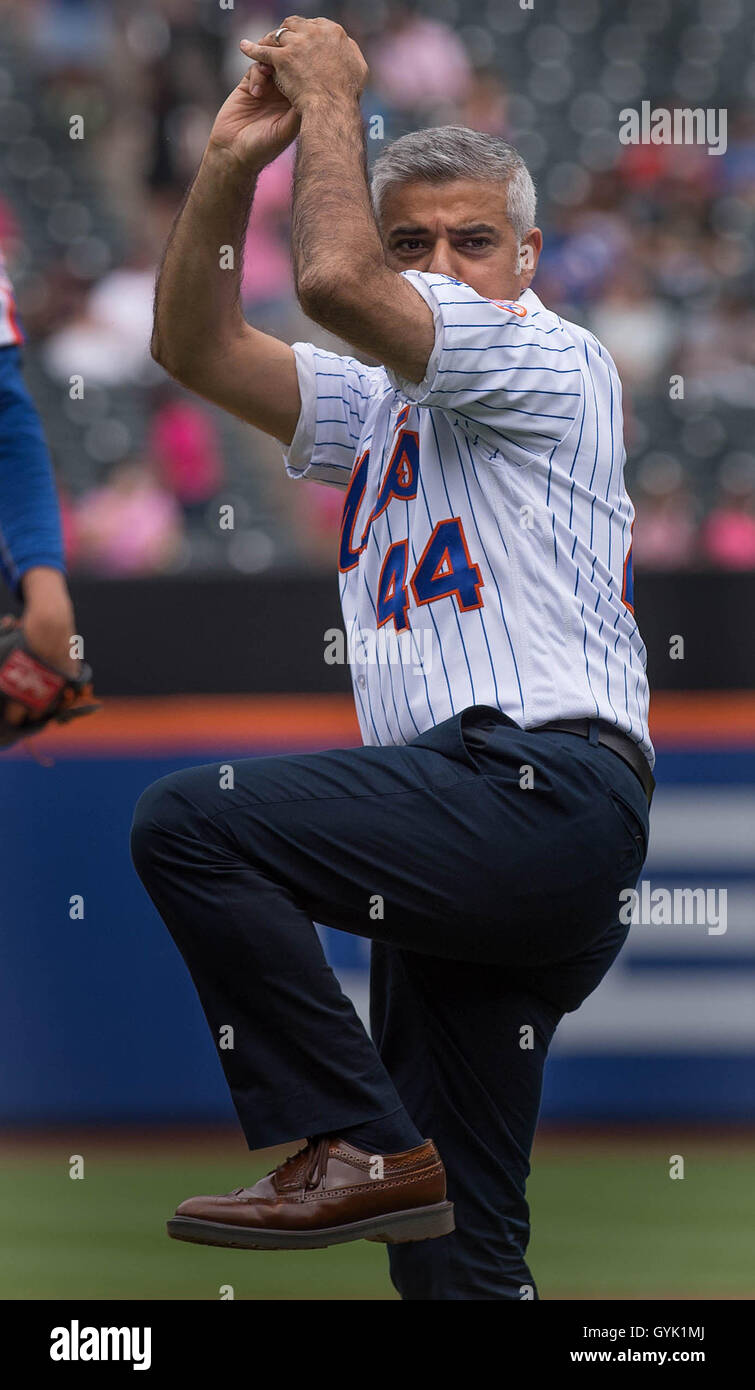 Mayor of London Sadiq Khan pitches the first ball at a baseball game between New York Mets and Minnesota Twins at Citi Field in New York City, during a three day visit to the US capital as part of his visit to North America, where he is due to meet NYC Mayor Bill de Blasio. Stock Photo