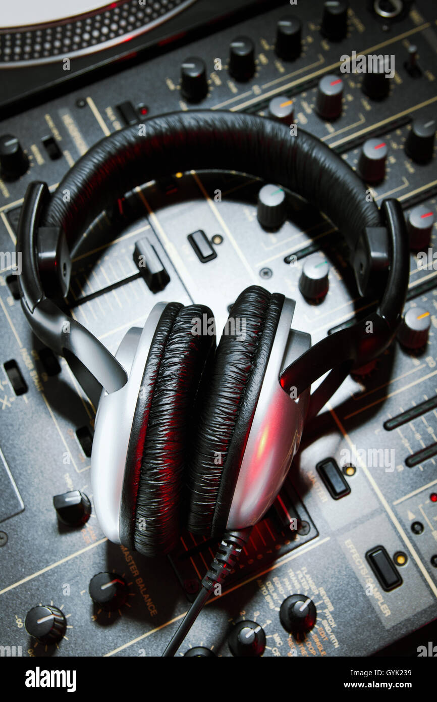 Professional DJ stereo headset on mixing controller Stock Photo