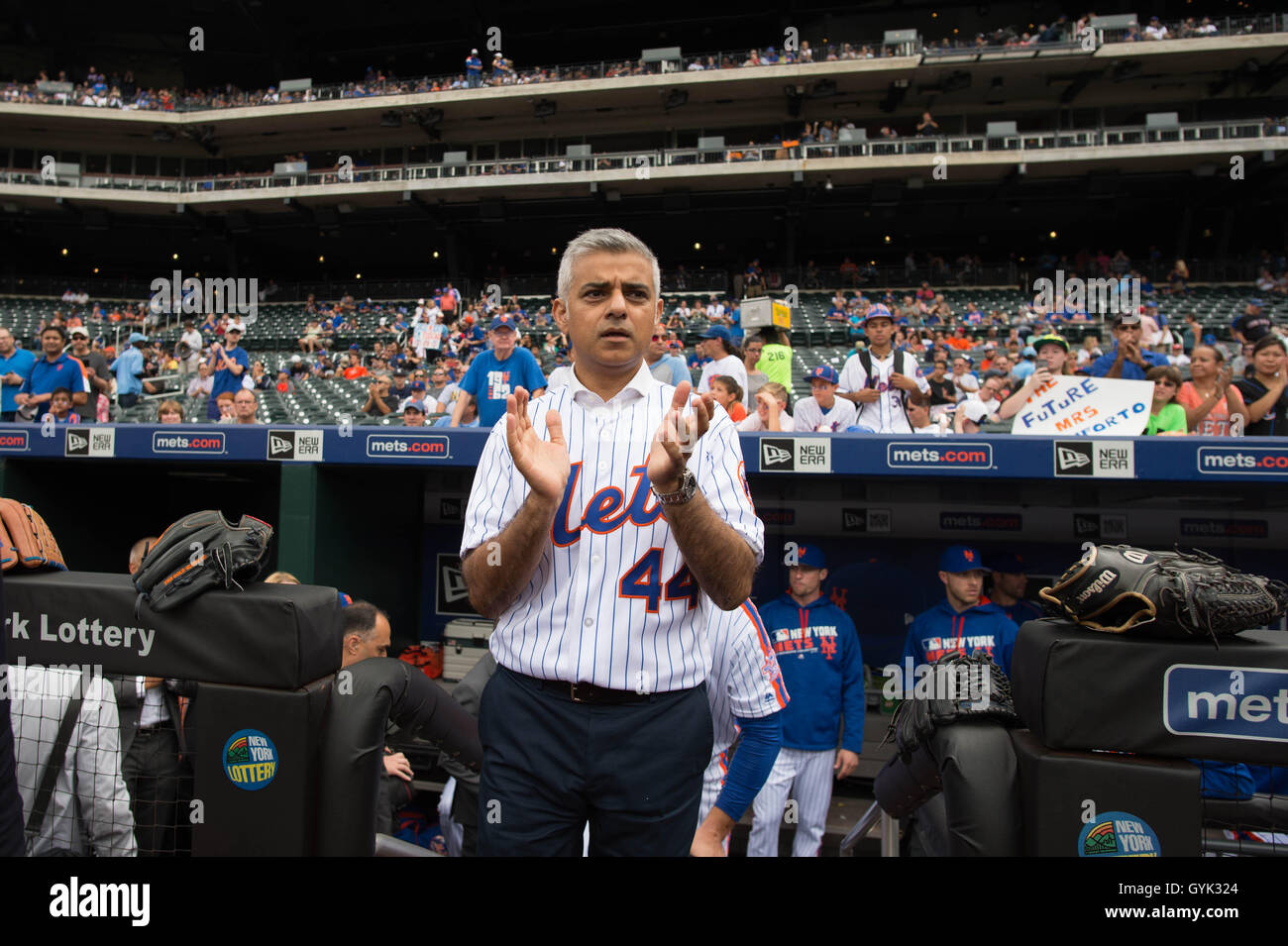 Mayor of London Sadiq Khan wears a shirt with his name on as he arrives to pitch the first ball at a baseball game between the New York Mets and Minnesota Twins at Citi Field in New York City (NYC) during a three day visit to the US capital as part of his visit to North America. Stock Photo
