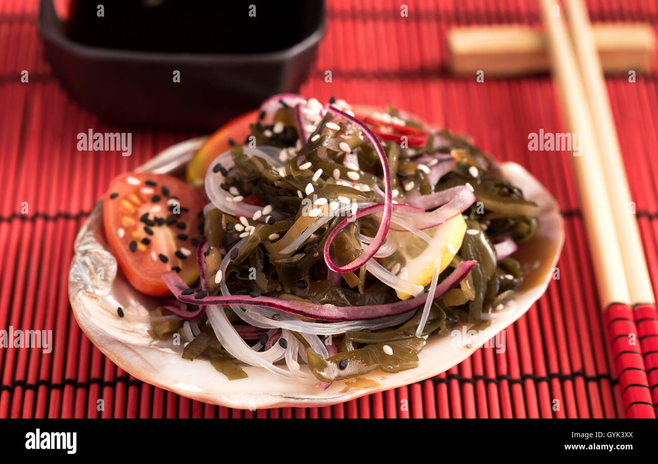 Seaweed salad on red napkin Stock Photo Alamy