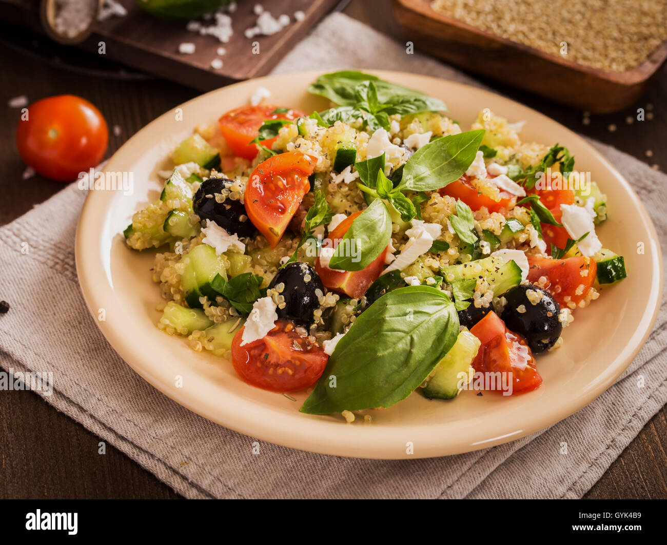 Tomato cucumber feta olive quinoa salad Stock Photo Alamy