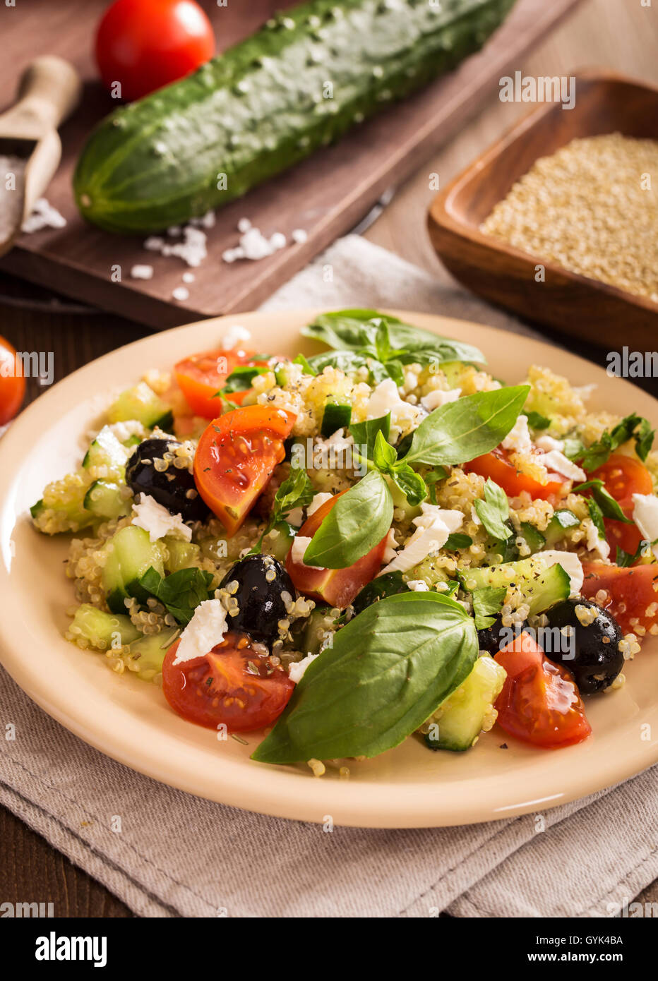 Tomato cucumber feta quinoa salad Stock Photo Alamy