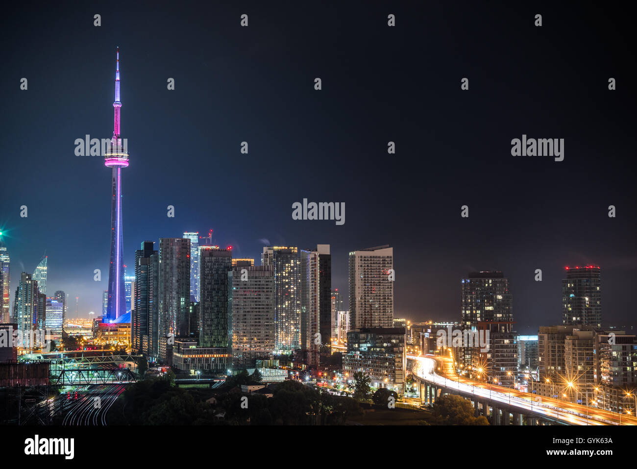 Rooftop panoramic of city Torontoskyline.  Buildings & office towers on hot, humid August night Capitol city of Ontario, Canada. Stock Photo