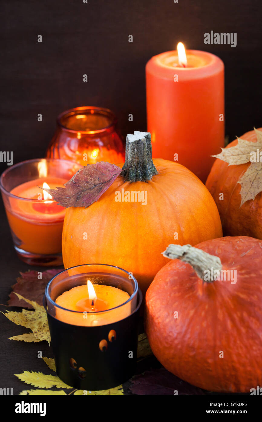 Decorative halloween pumpkins and candles Stock Photo