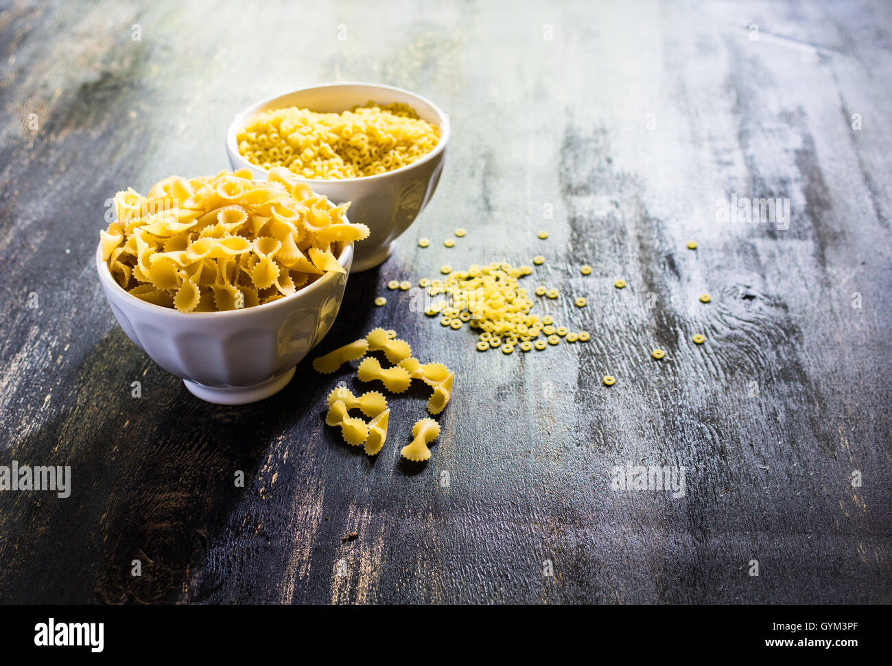 Pasta collection on rustic wooden background Stock Photo - Alamy